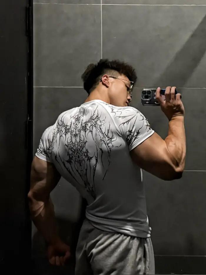T-shirt de sport pour homme à séchage rapide, col rond, compression, manches courtes, pour la course