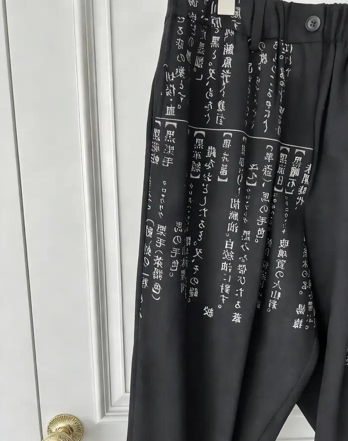 Pantalon décontracté imprimé à décharge de dictionnaire de conception originale TOP-YAMAMOTO avec st