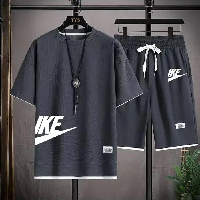 Vente chaude d'été hommes décontracté à manches courtes T-shirt shorts ensemble de sport en plein ai