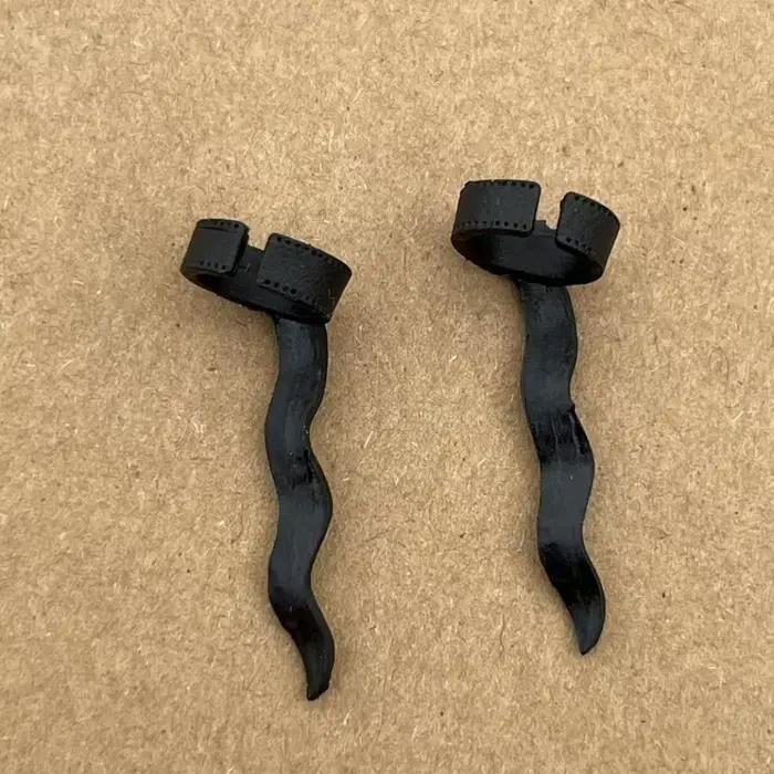 Boucles d'oreilles de poupée monstre