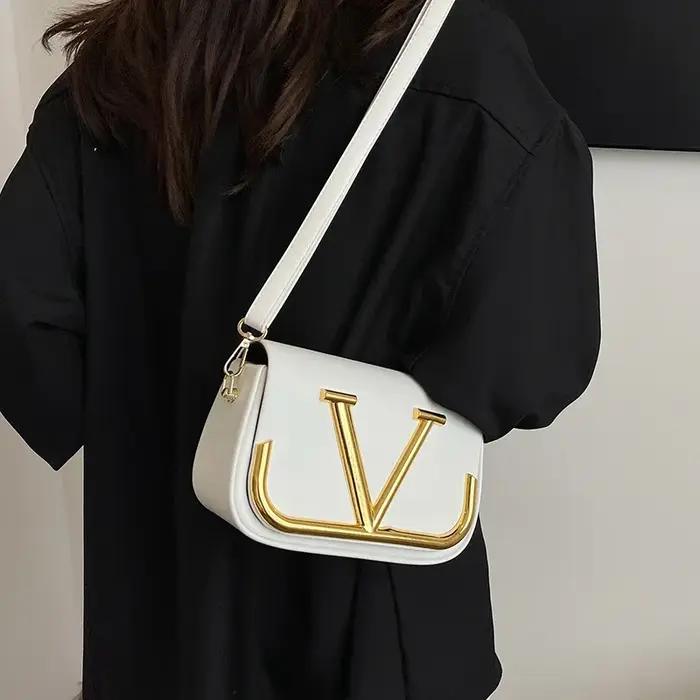 Sac à bandoulière minimaliste haut de gamme pour femme en cuir grainé premium avec sangle réglable,