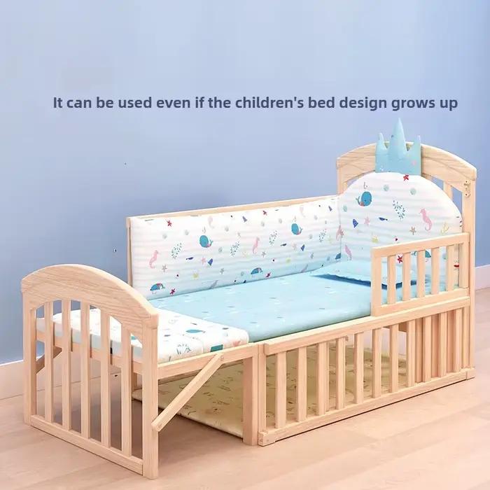 Lit bébé multifonctionnel en bois massif avec mobile, table à langer et moustiquaire pour sécurité et confort optimal occasions spéciales