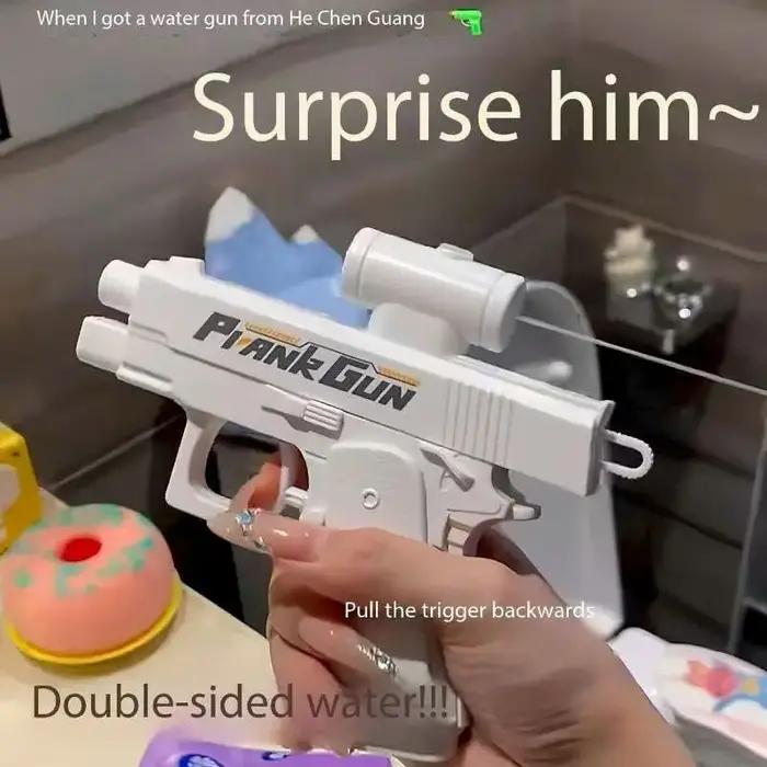 Pistolet à eau inverse Double face drôle-jouet de farces d'été, Mini pulvérisateur d'eau tactique po