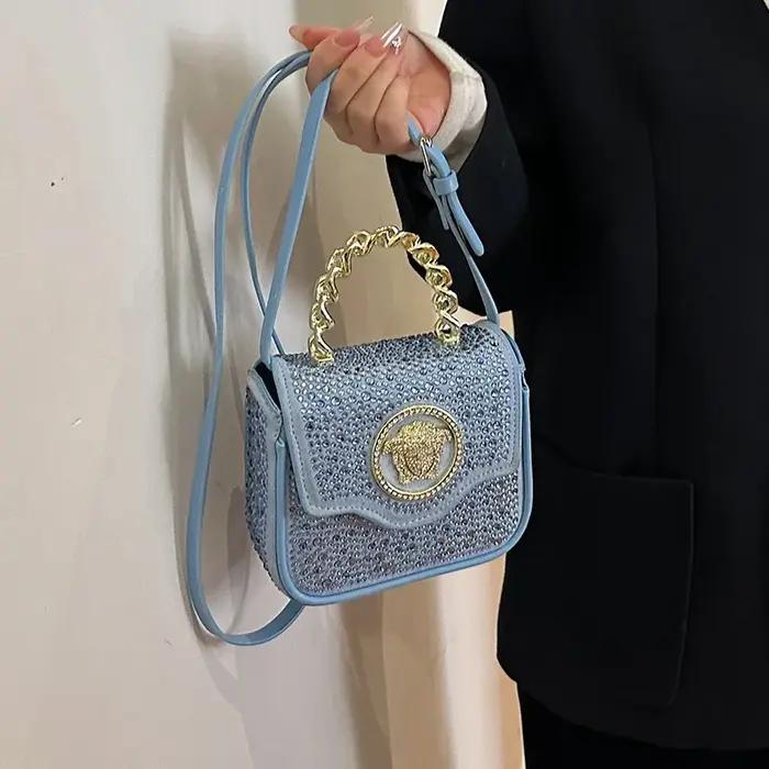 Pochette classique inspirée des créateurs, convertible en sac bandoulière, avec un style parisien et